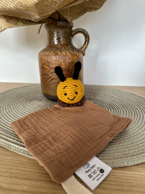 Crocheted bee baby comforter with brown material