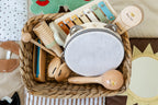 Wooden instrument set in a woven basket